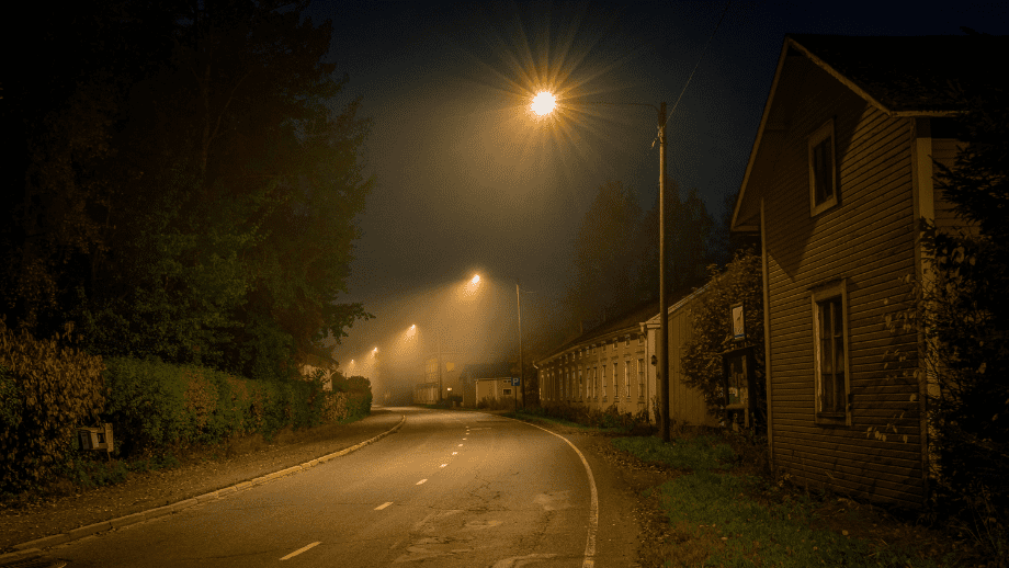 Row of houses in a poorly-lit street, giving a spooky impression.